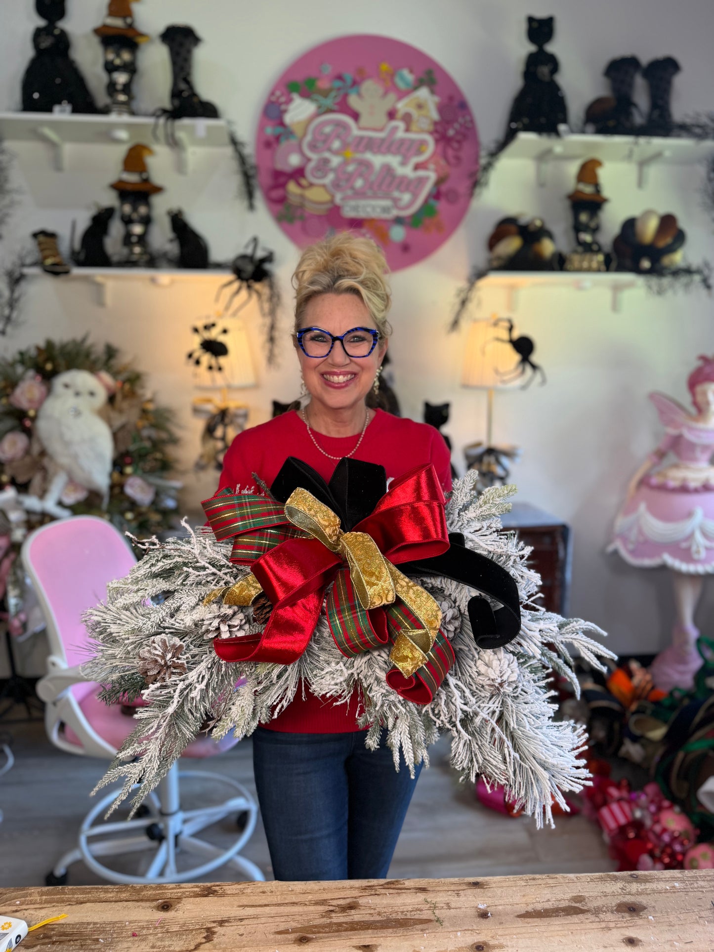 Over the mirror flocked Christmas swag