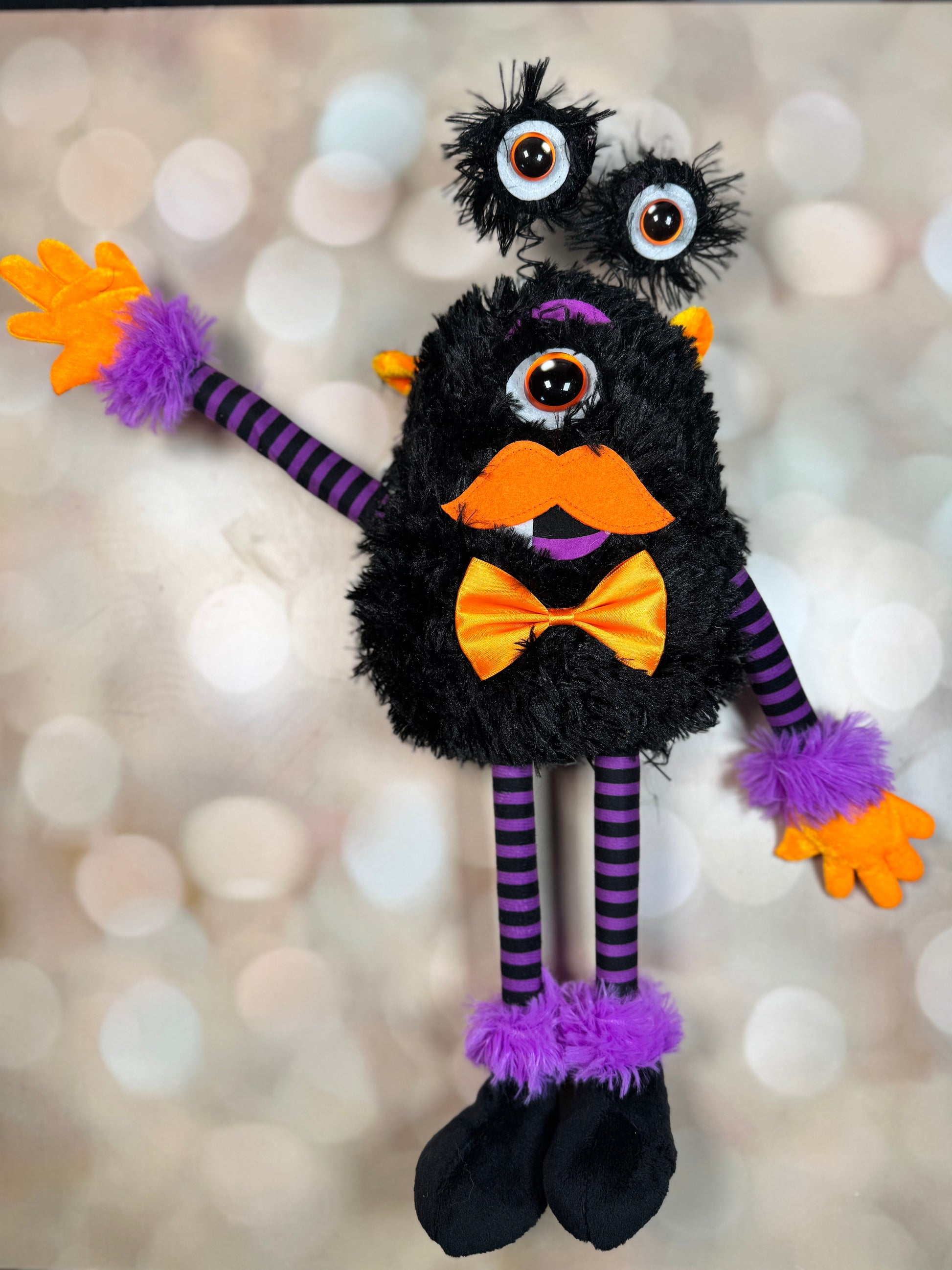 15.25"H PLUSH MONSTER W/BOWTIE DECOR BLACK/ORANGE/PURPLE - Burlap and Bling Decor