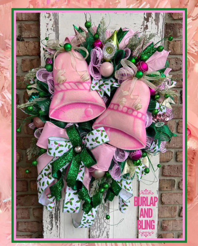 A bell wreath featuring multiple items secured with craft pipe cleaners