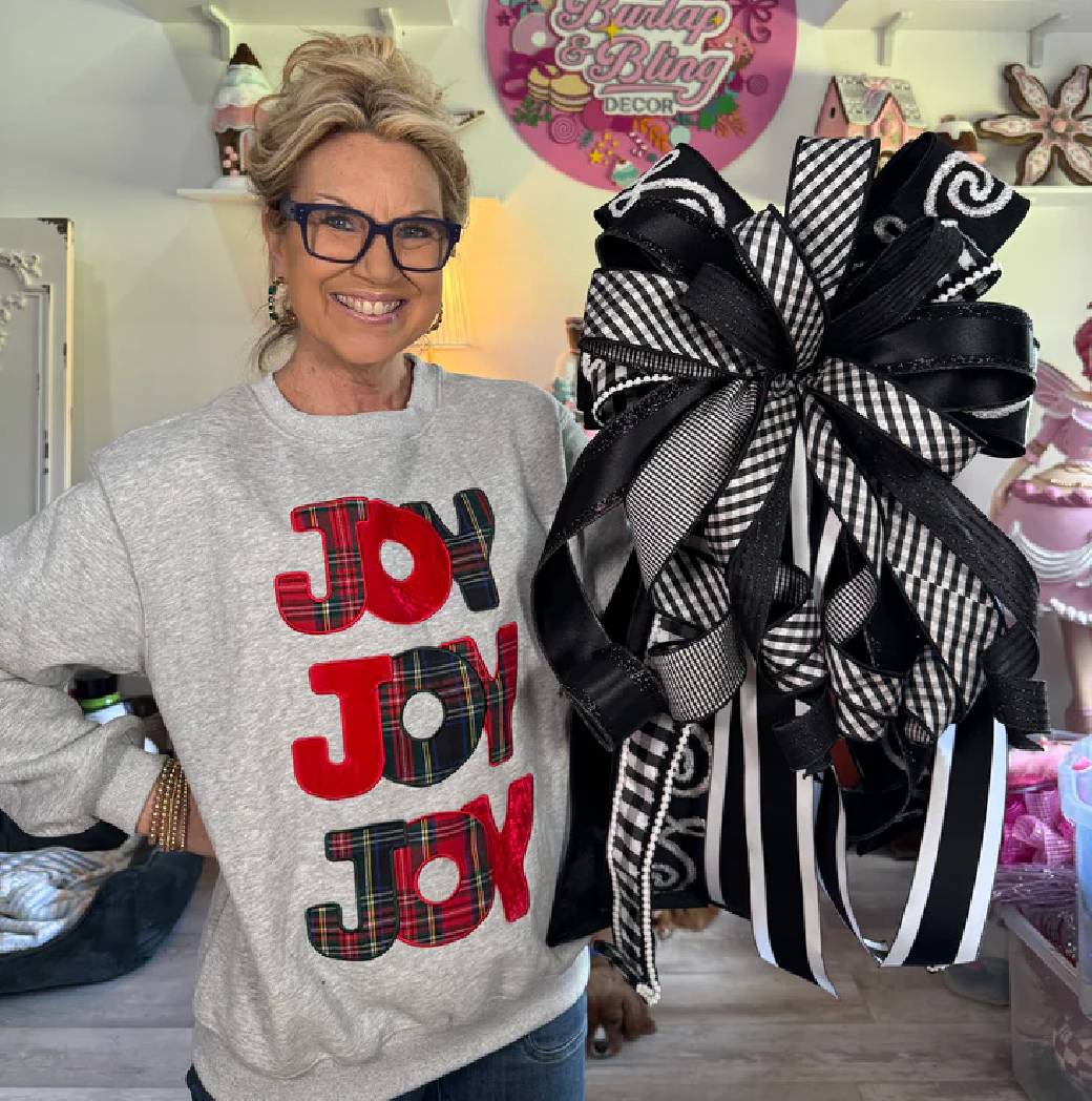 Jen with an oversized bow featuring large-width ribbons