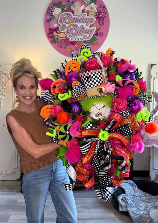 Jen displays a festive piece of decorative home decor