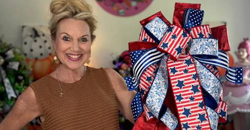Jen displays a patriotic bow made with the help of crafting tools